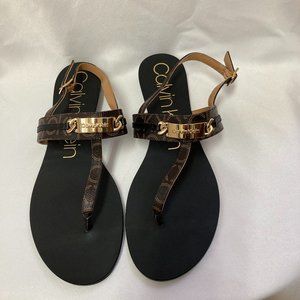 calvin klein brown and black monogrammed sandles with gold toned hardware sz 9.5